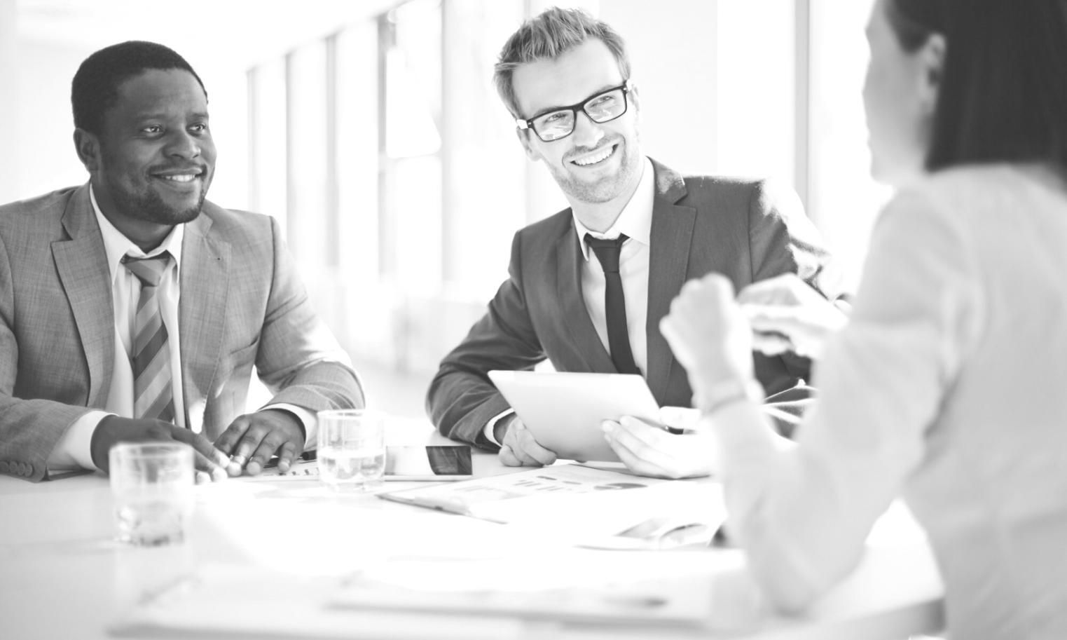 Students collaborating on advertising campaign development in modern workspace